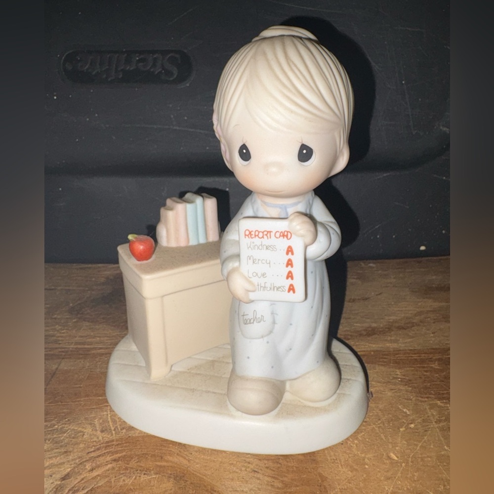 Precious Moments Porcelain Teacher Figurine. “Love Never Fails”.
